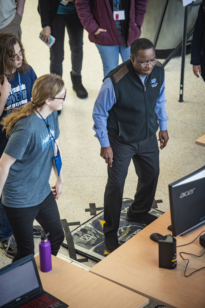 MTSU President Sidney A. McPhee participants in Hack MT "Breakdown Game" challenge.